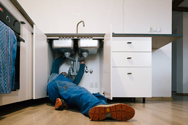 Professional Plumbing technician working in Huggins, MO